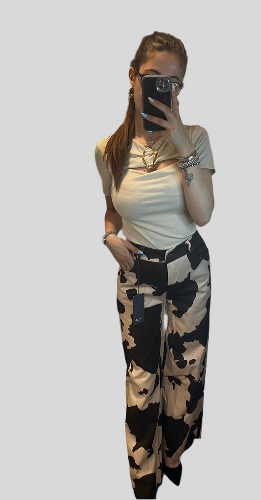 Pantalone di jeans muccato