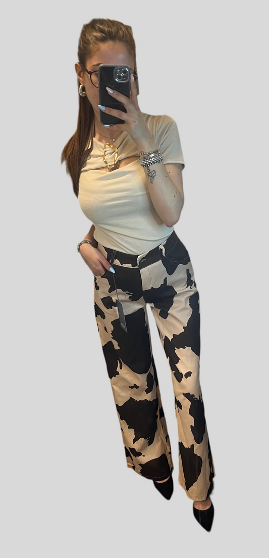Pantalone di jeans muccato
